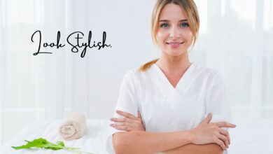A beauty therapist wearing a white shirt looking stylish, ready to provide professional services