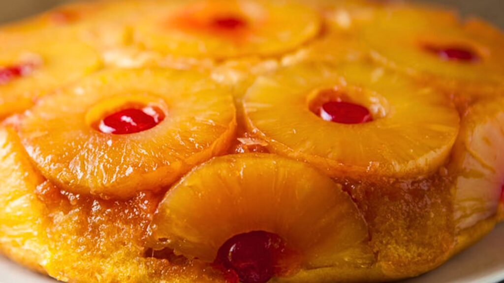 A colorful mouthwatering upside down pineapple cake, one of the perfect summer desserts for satisfying your sweet tooth