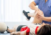 A girl having a massage therapy from a sports massage specialist