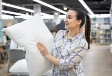 Young woman busy promoting her bedding business